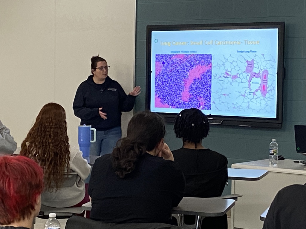 Zucker speaking to students