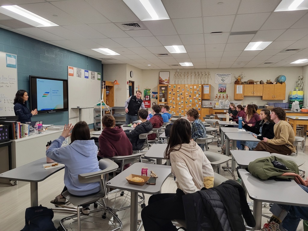 students engaged in presentation