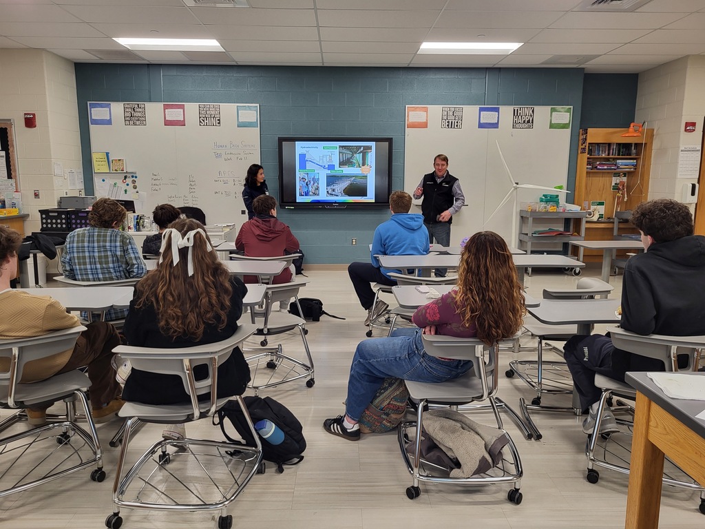 students engaged in presentation