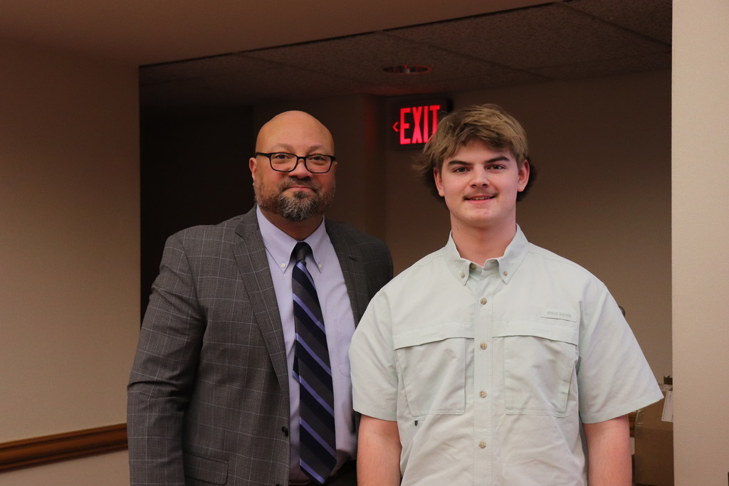 Mr. Brison with David Phillips at the Board meeting