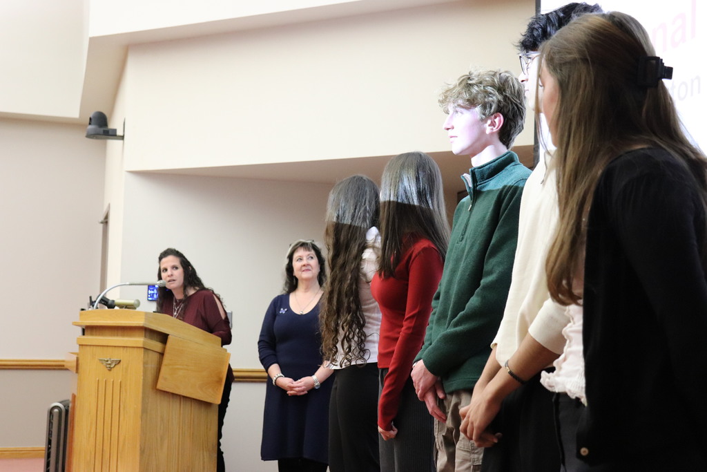 The high school's National Merit Scholars were honored at the Board meeting