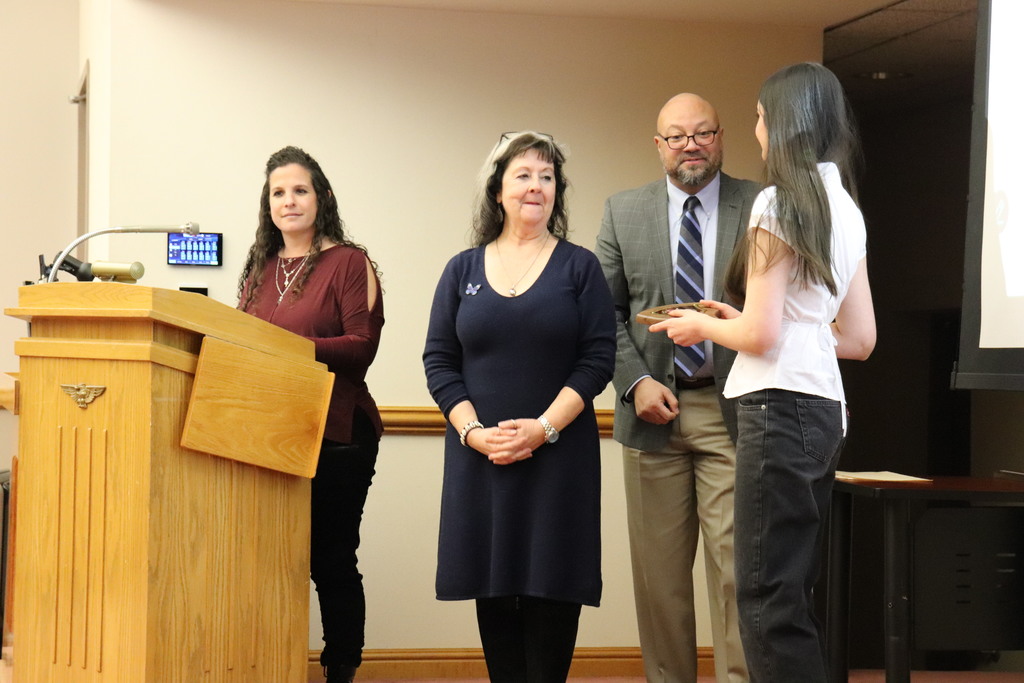 The high school's National Merit Scholars were honored at the Board meeting
