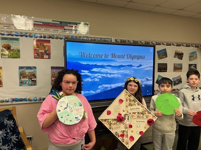 Image of 6th grade students learning about Greek gods and goddesses. 