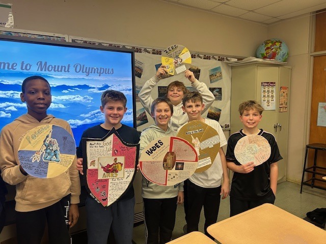 Image of 6th grade students learning about Greek gods and goddesses. 