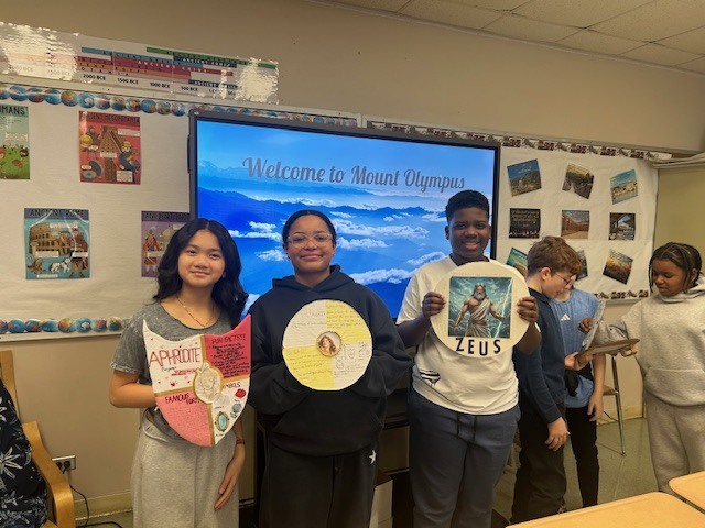 Image of 6th grade students learning about Greek gods and goddesses. 