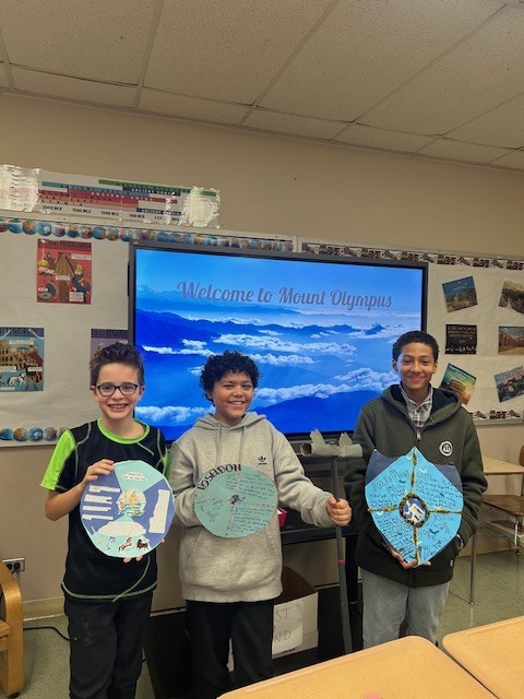 Image of 6th grade students learning about Greek gods and goddesses. 