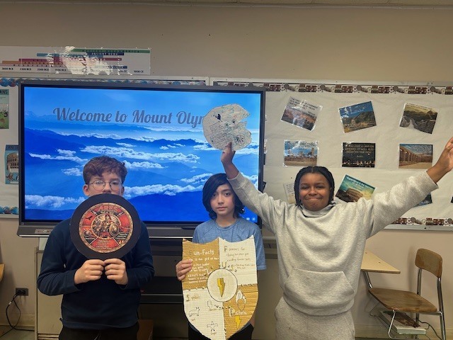 Image of 6th grade students learning about Greek gods and goddesses. 