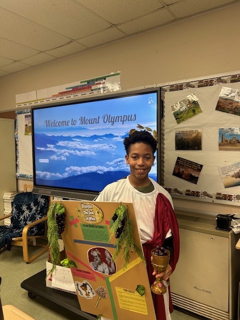 Image of 6th grade students learning about Greek gods and goddesses. 