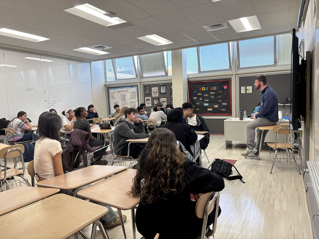 Gibbs speaking to students