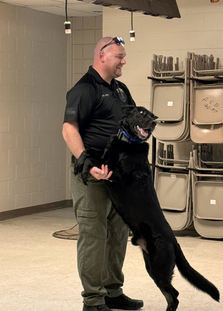The Officer and K9 dog presenting