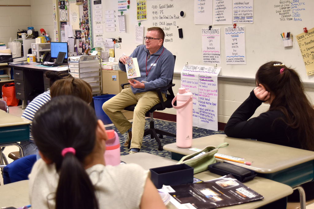 Assistant Superintendent Dr. Melchor reads to Rydal students