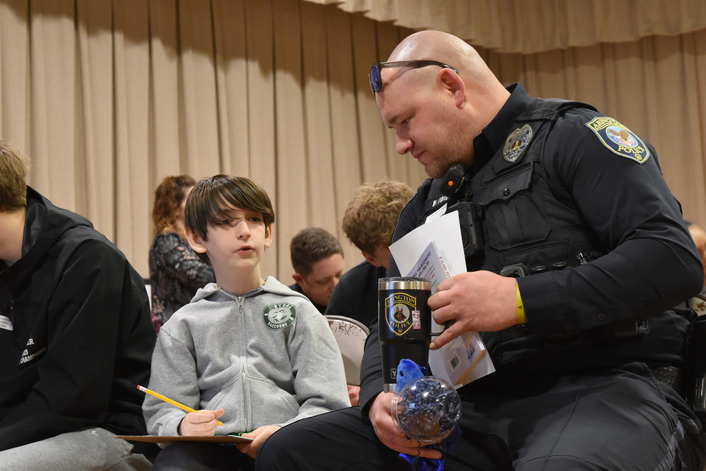 A Rydal 5th grader interviews an Abington Police Officer