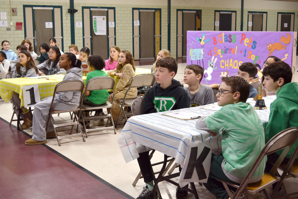 Rydal 5th graders listen to the One Book School presentation while waiting to interview their special guests.