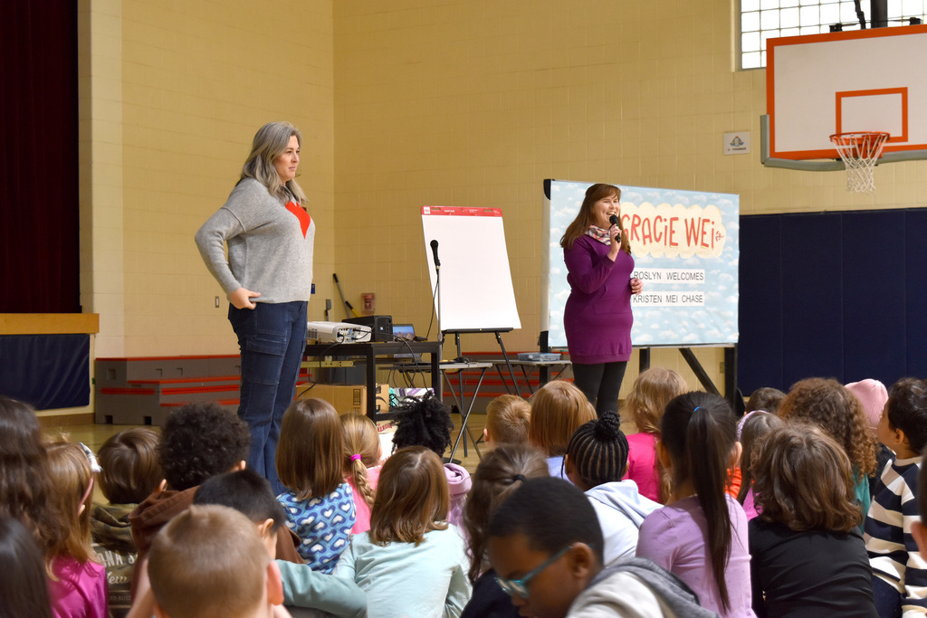 Ms. Darrah speaks to students about Ms. Mei Chase's books