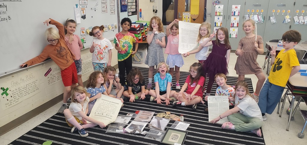 Ms. Bradbury's class with artifacts from the Revolutionary War