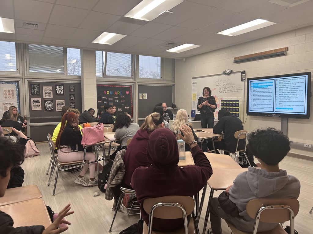 Ms. Mafaru explaining her job to a classroom