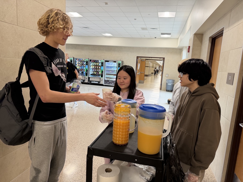 Fruit ninjas handing out juice