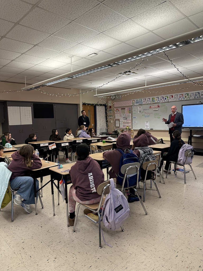 Mr. Jeff Bates meets with student Ambassadors in a McKinley classroom