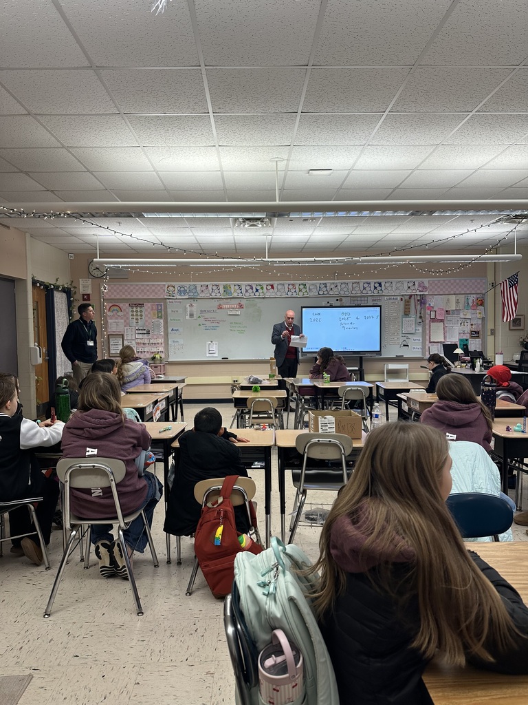Mr. Jeff Bates meets with student Ambassadors in a McKinley classroom