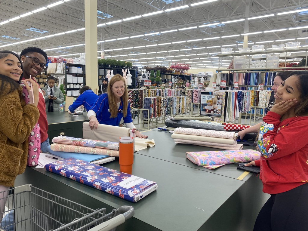 Students get their fabrics cut