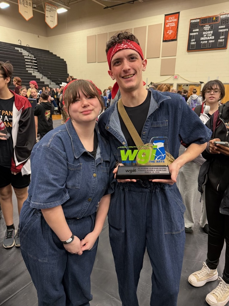 Two Students, Cassidy McIntyre and Jameson Thorpe , representatives of the RA Colorguard posing with their second place WGI Trophy 