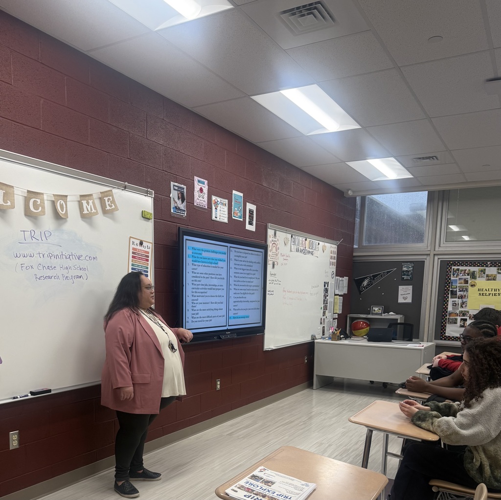 Dr. Theresa Austria is talking to a class of students. 