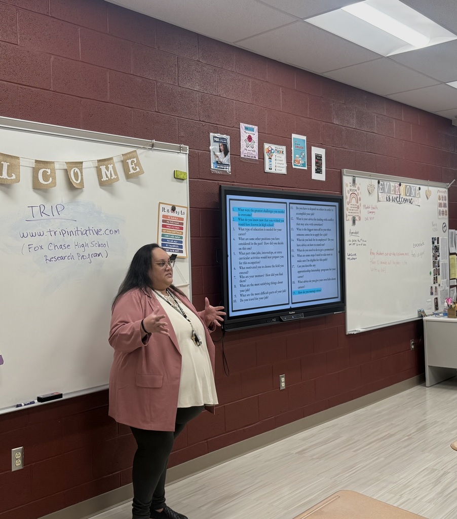 Dr. Theresa Austria is talking to the class of students. 