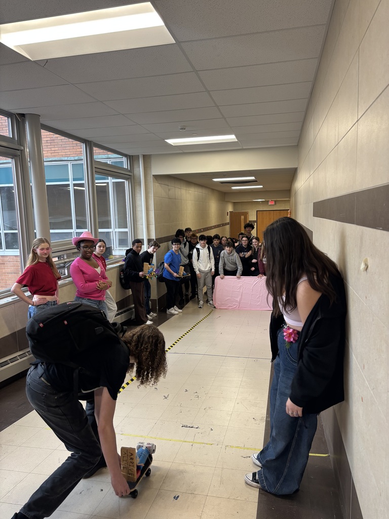 Kids at a barbie car station 