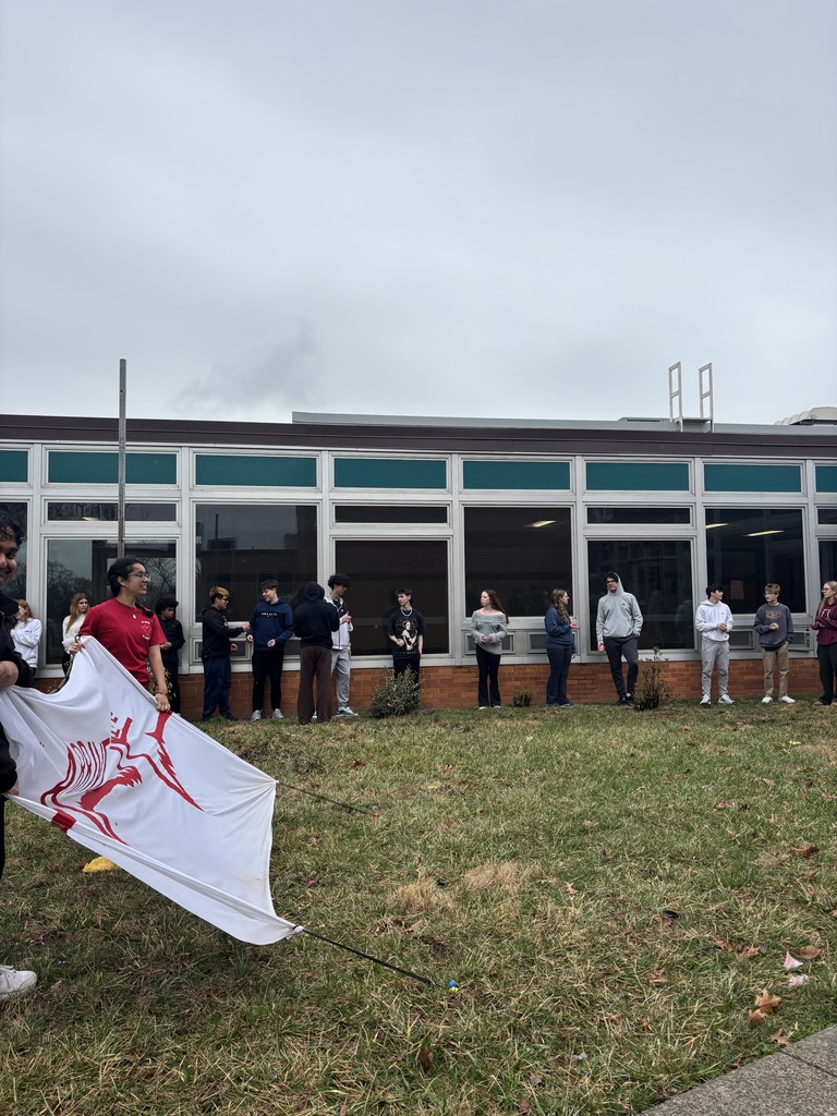 Students at a water balloon station 