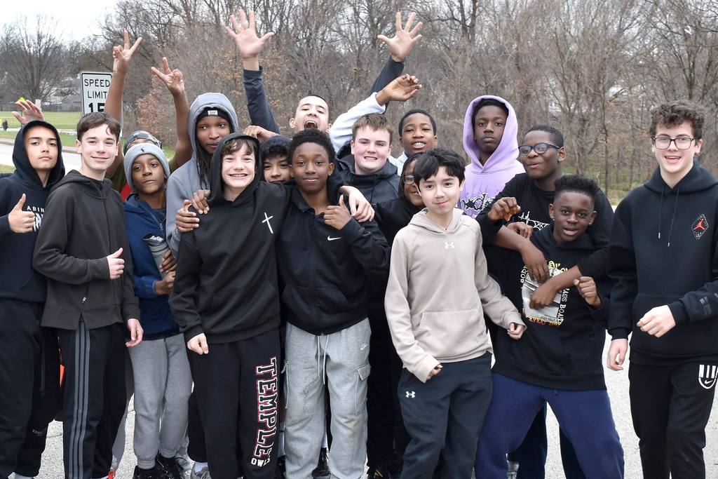 A group of Buddy Walk participants gather outside during the 9th Annual Buddy Walk.