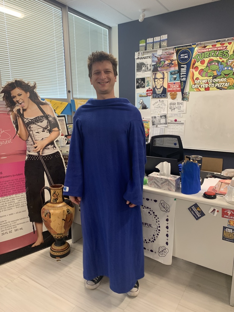 ASHS teacher posing for Abing-Thon’s comfy clothes Thursday