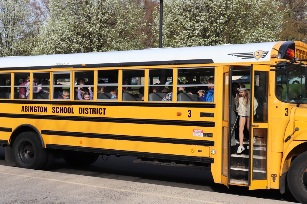 Student getting off school bus
