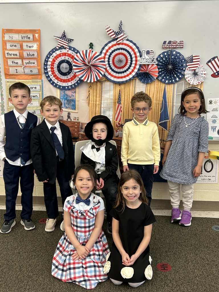 Kindergarten students dressed in their president costumes