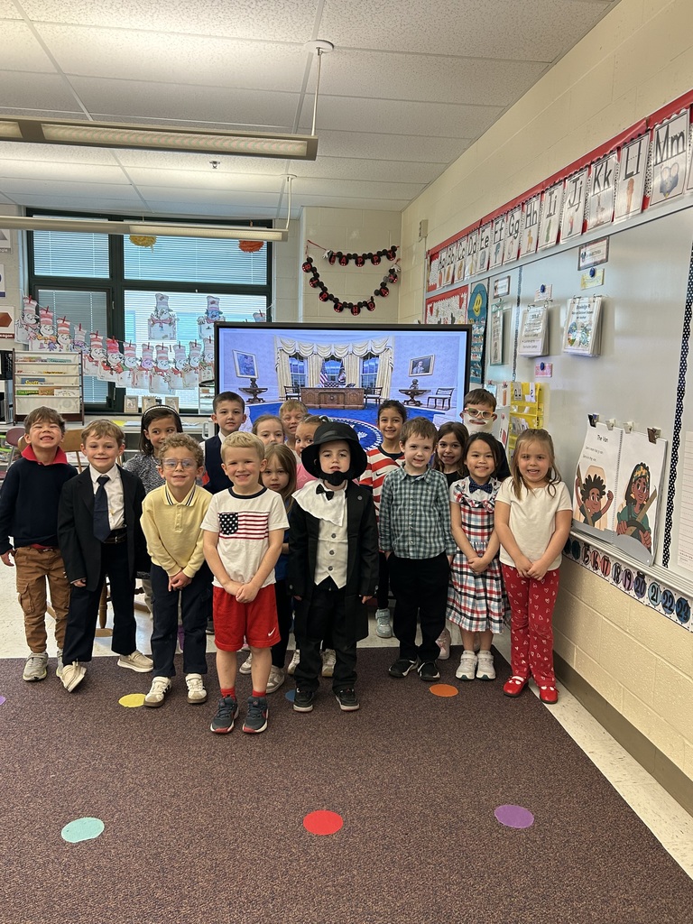 Kindergarten students dressed in their president costumes