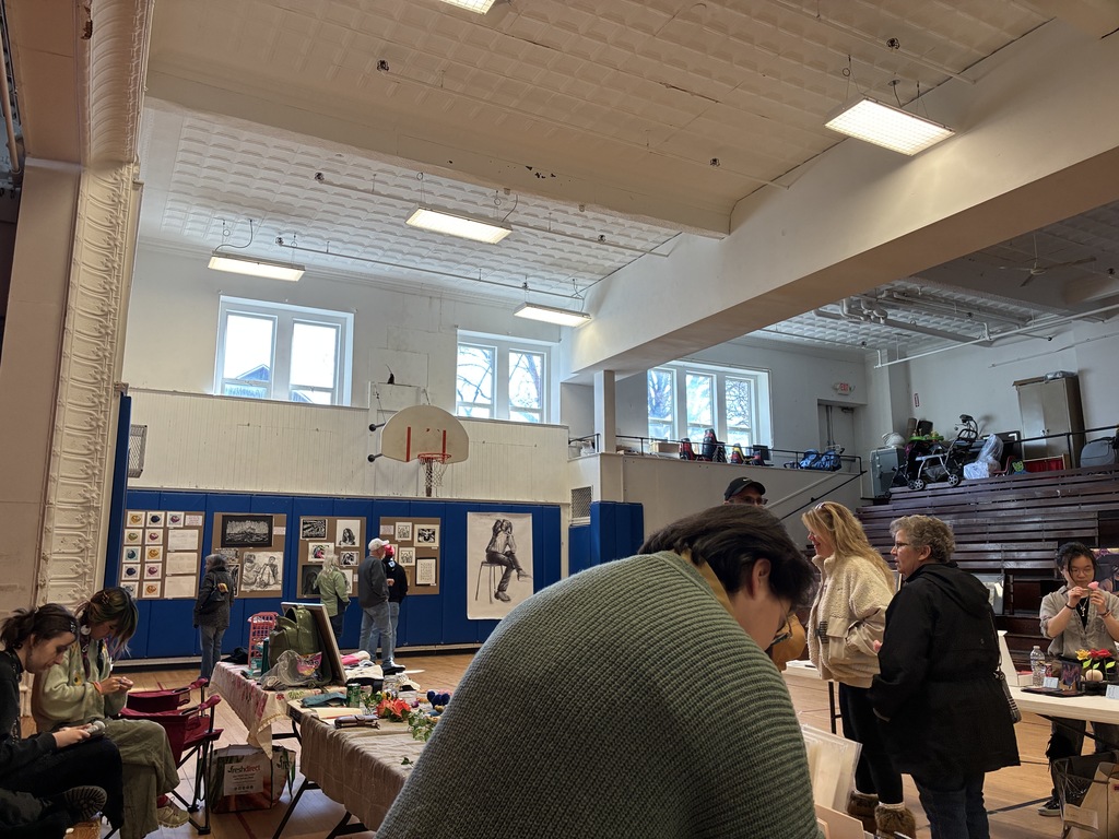 View of the shop and show with customers and vendors