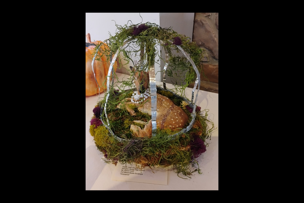 A 3-D sculpture of a deer in a nest-like structure by Kason Jean Charles, grade 12
