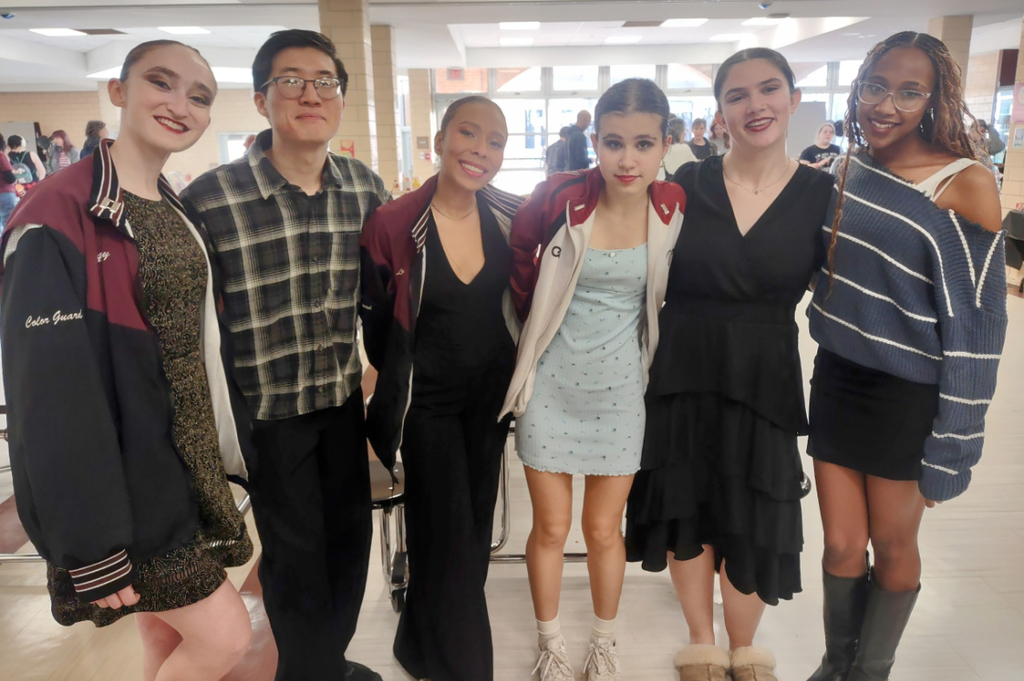 people smiling for a photo 