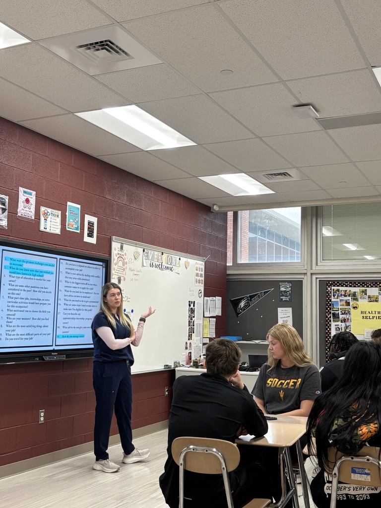 Kayla speaking to students.