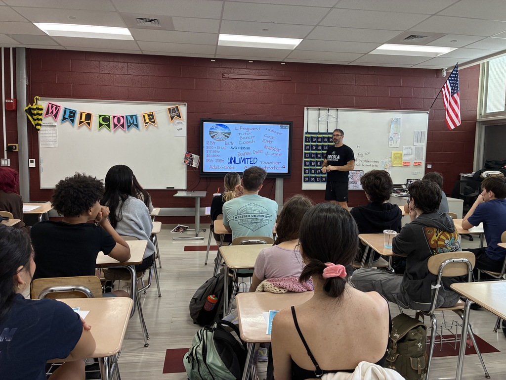 Ryan Weathers talking to students