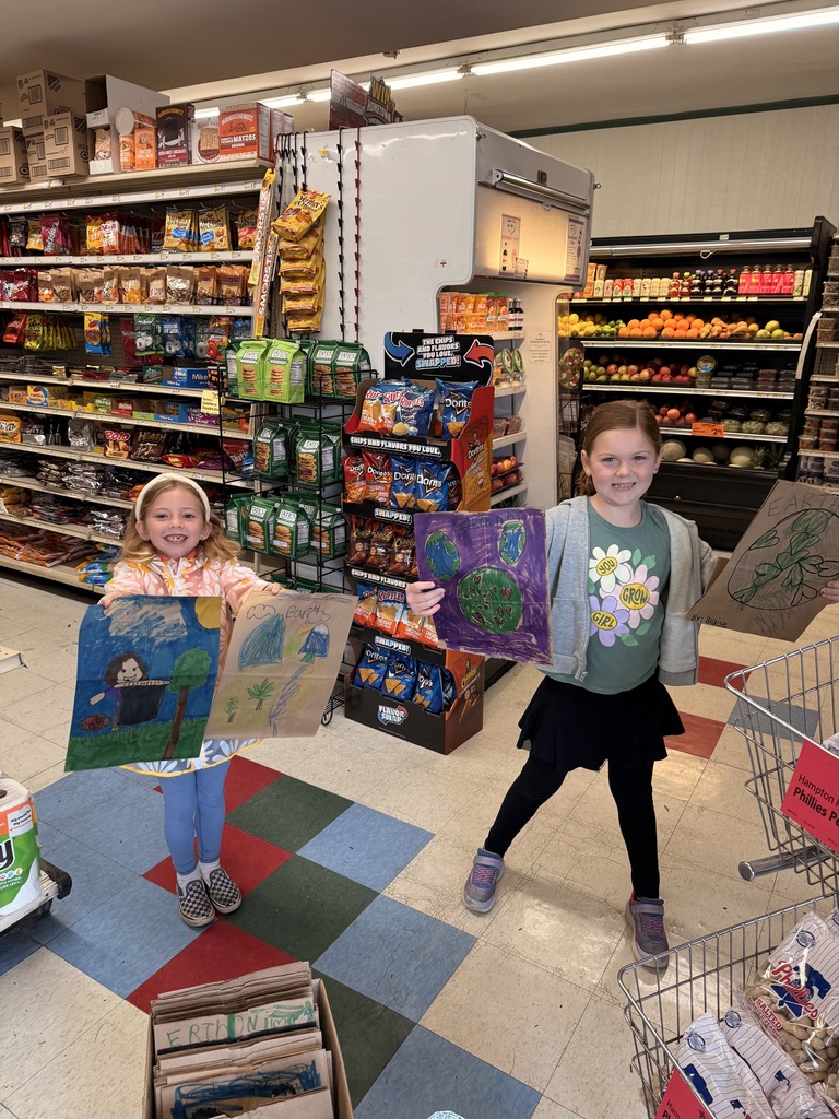 Students at the local market with their Earth Day bags