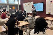 Mr. Krisbergh talking to students