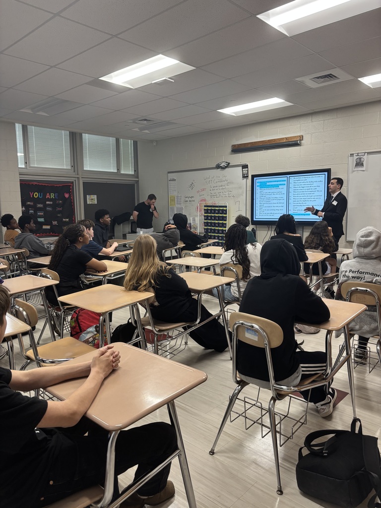 Mr. Caristo talking to students