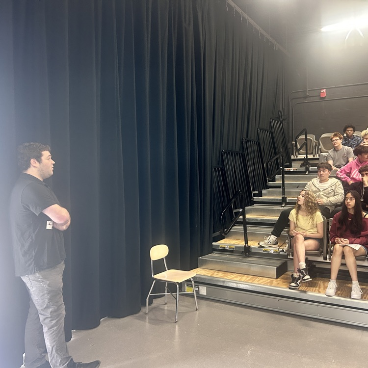 speaker talking to students