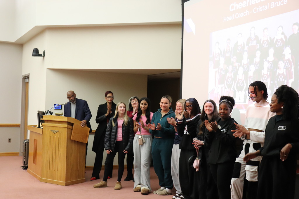 Cheer team honored at the Board meeting