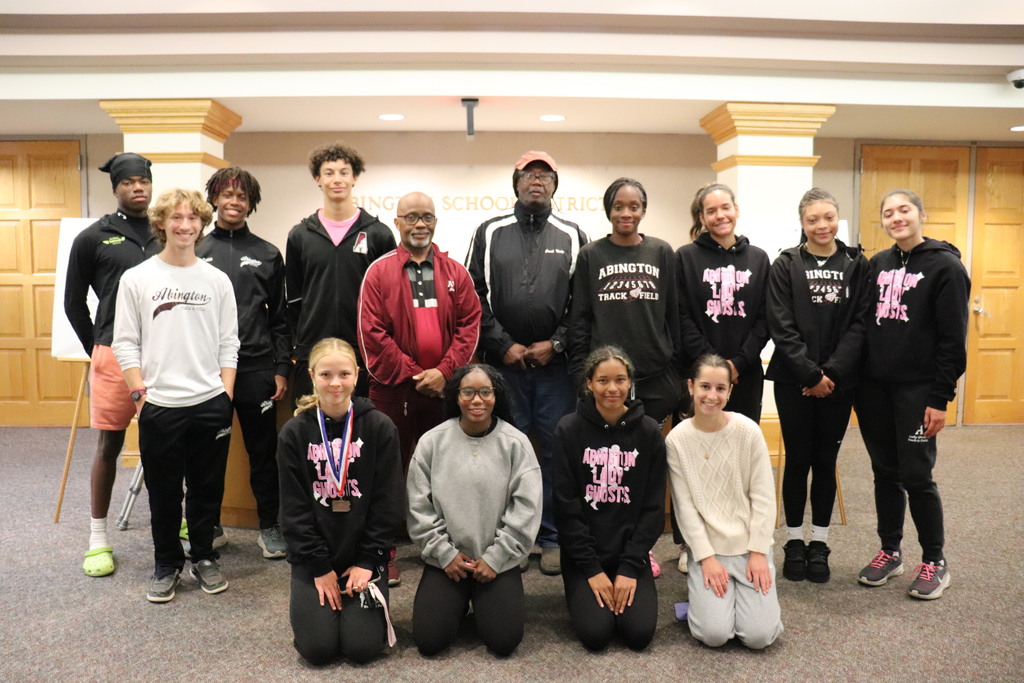Boys and Girls winter track with their coaches