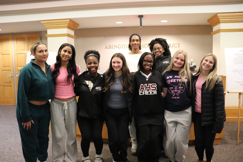 Cheer team and their coach