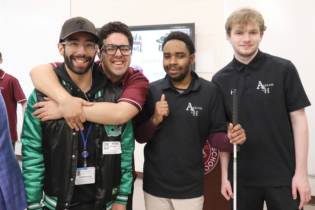 ACTIVE Academy students pose with a member of a supporting organization.
