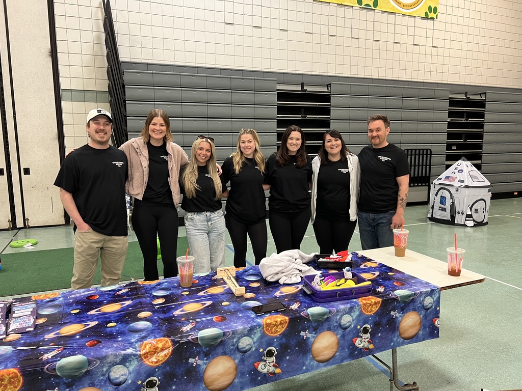 Teachers smiling at the Autism Event