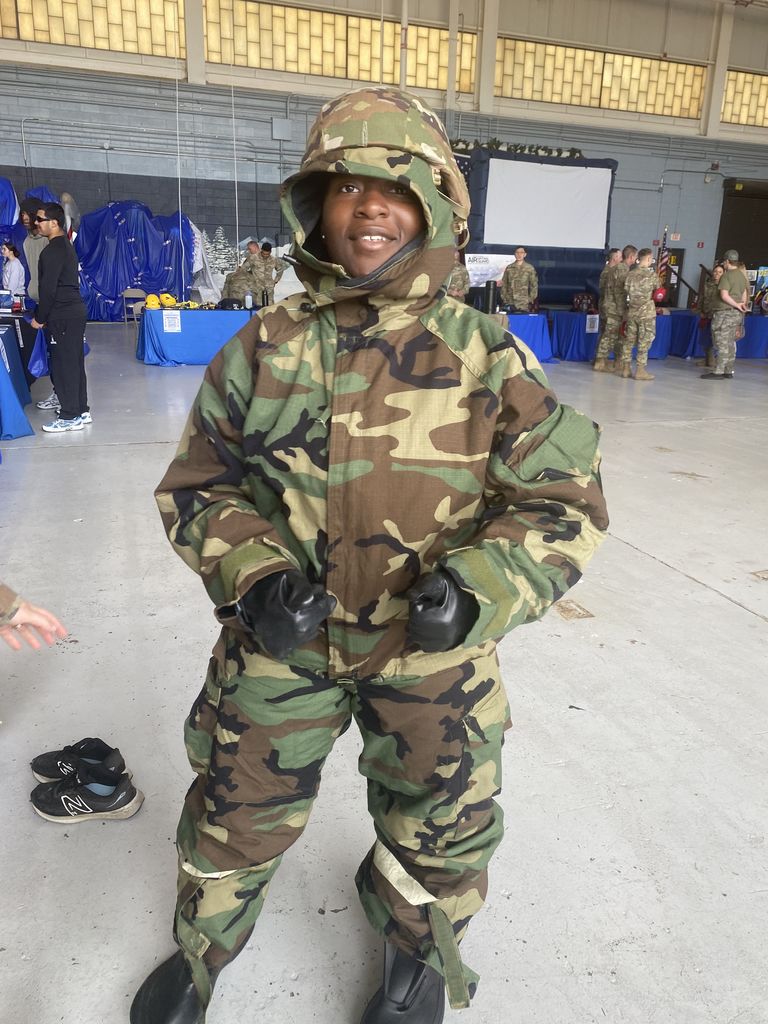 student trying on gear