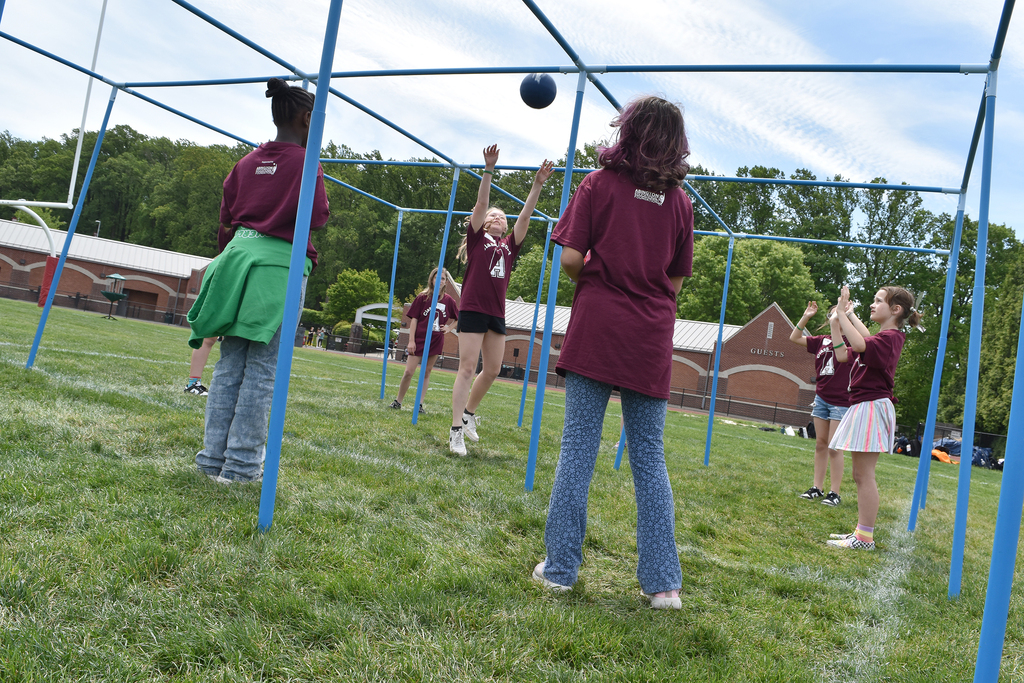 Students play a team-building game of ball during CommUNITY Day